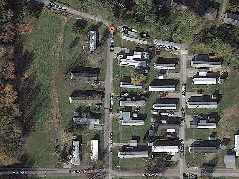 Home damaged, shed destroyed early Tuesday in fire of suspicious origin