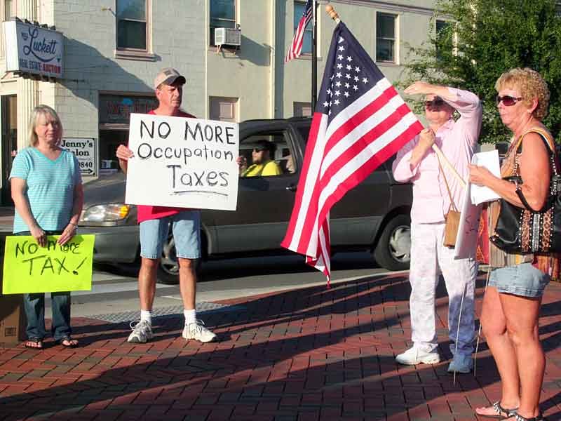 County, city residents take part in tax protest Friday on Court Square